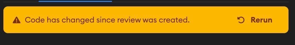Outdated warning banner reading "Code has changed since review was created" with a Rerun button